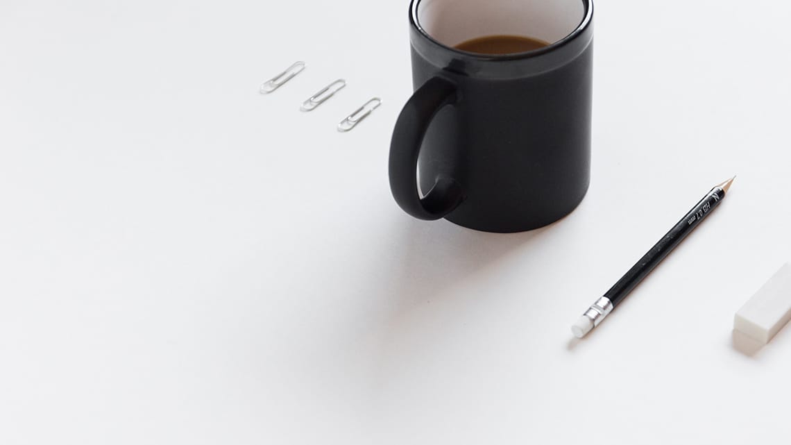 Coffie on table with pencil